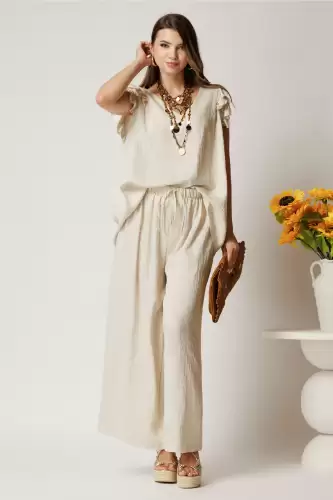 Compleu ivory din viscoza cu bluza si pantaloni lejeri