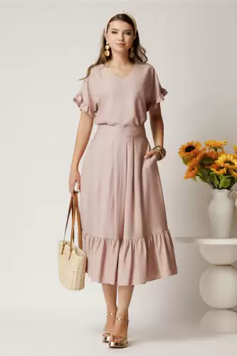 Fusta midi roz din rayon in clos cu volan la baza