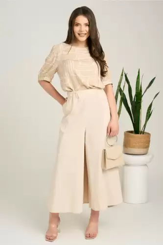 Pantaloni bej lejeri tip fusta din viscoza cu elastic in talie