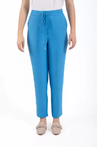 Pantaloni casual bleu din vascoza cu buzunare laterale si snur reglabil