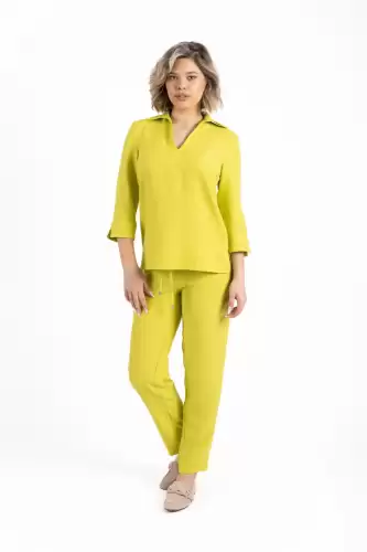 Pantaloni casual din vascoza cu buzunare laterale si elastic la talie