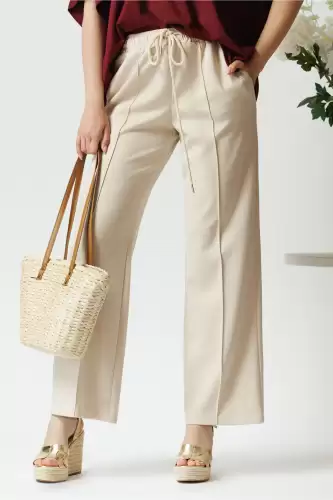 Pantaloni casual din viscoza bej cu elastic si dunga