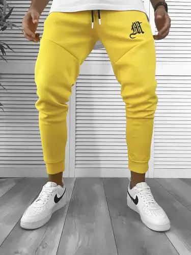 Pantaloni de trening galbeni  silon   conici 12375  26-5.1
