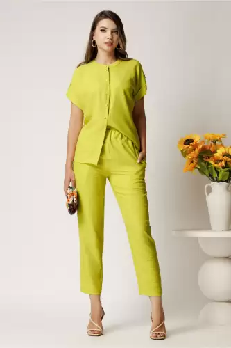 Pantaloni DY Fashion verde lime din material vaporos cu elastic in talie si buzunare