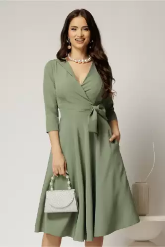 Rochie Dy Fashion verde fistic cu decolteu petrecut si funda maxi