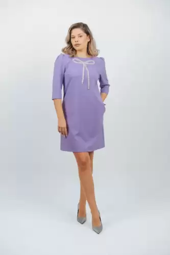 Rochie eleganta cu detalii pretioase in forma de funda la bust