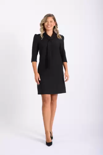 Rpchoe eleganta neagra cu buzunare laterale si design deosebit la guler